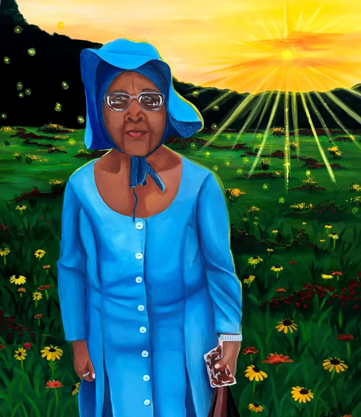 Portrait of an elderly Black woman standing in a wildflower field at sunset, wearing a blue bonnet tied under her chin and a matching blue button-front dress, with wire-rimmed glasses. She holds a foil-wrapped sandwich in one hand and a bag in the other; sunbeams and small floating lights cross the field behind her beneath an orange sky.