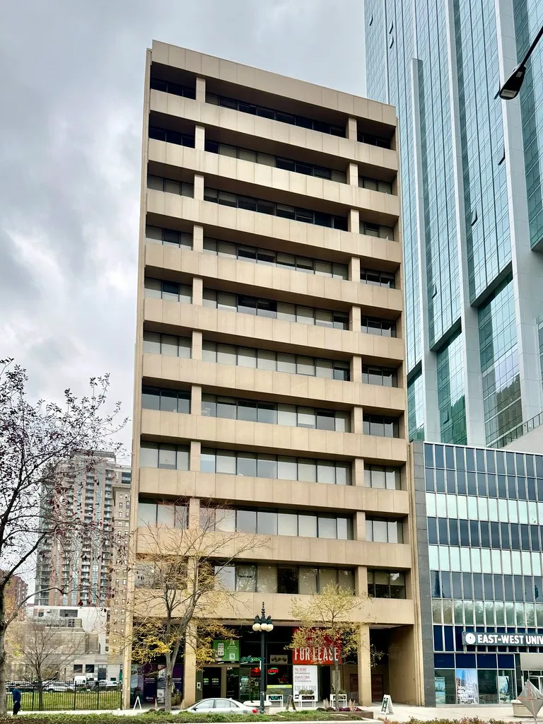 A modern color photograph of the former Johnson Publishing Company headquarters building, sometimes called the Ebony/Jet Building, on Michigan Avenue in Chicago.